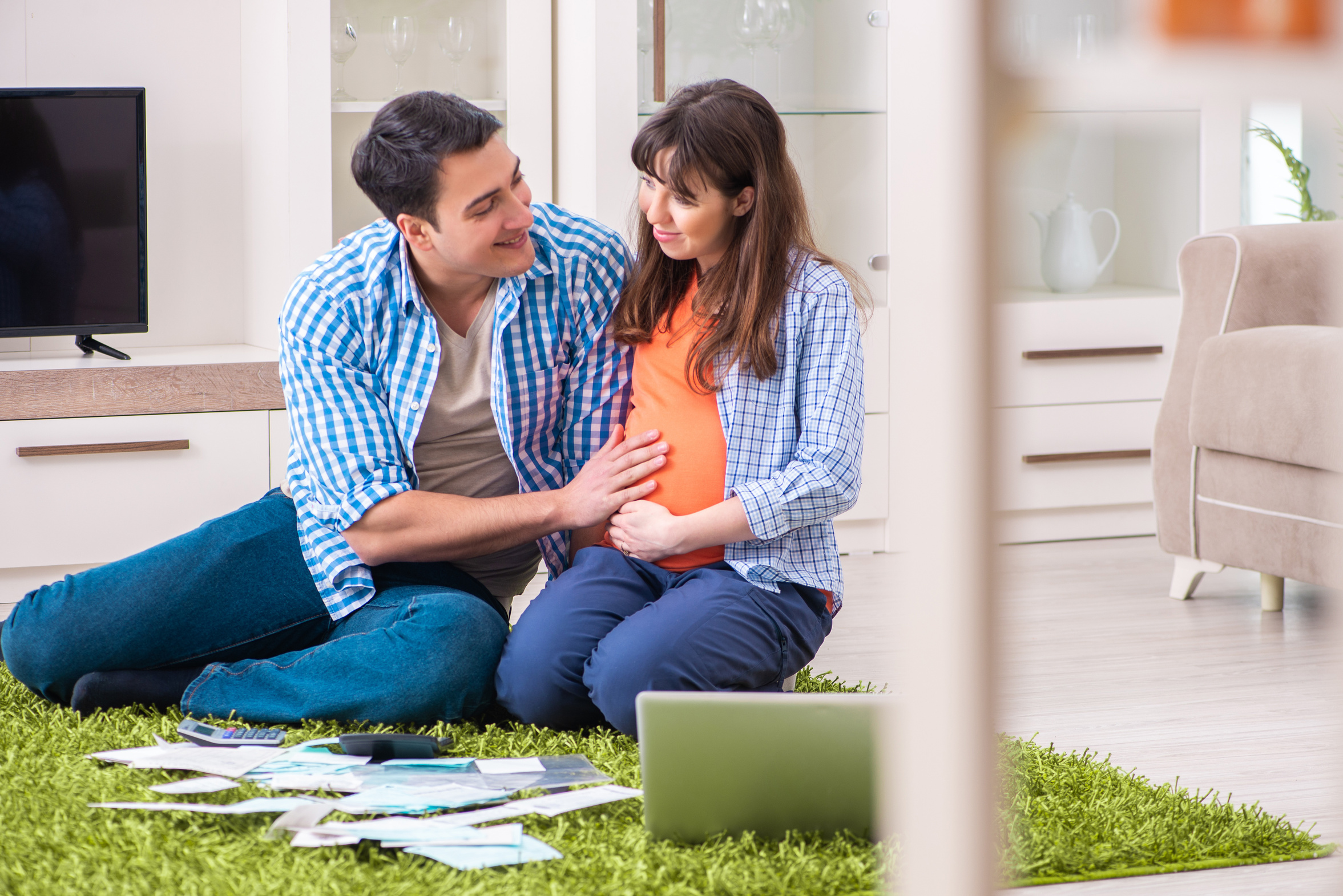 Young Family in Budget Planning Concept